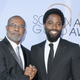 Ron Stallworth (L) and John David Washington attend the 25th Annual Screen Actors Guild Awards on January 27, 2019 in Los Angeles, California.